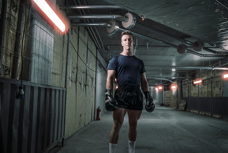 My friend Frederik posing with boxing gear. Shot with Cinestill 800 with the Canon EF 35mm f2.0 IS USM.