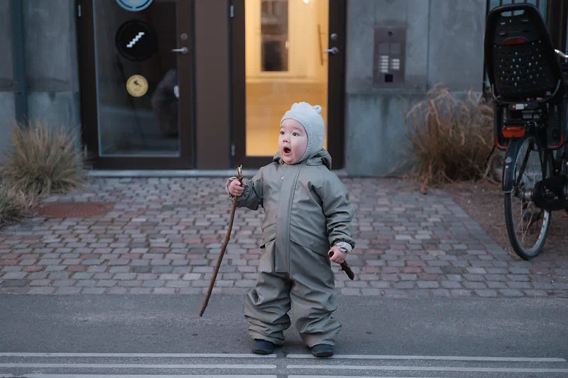 My son with a stick