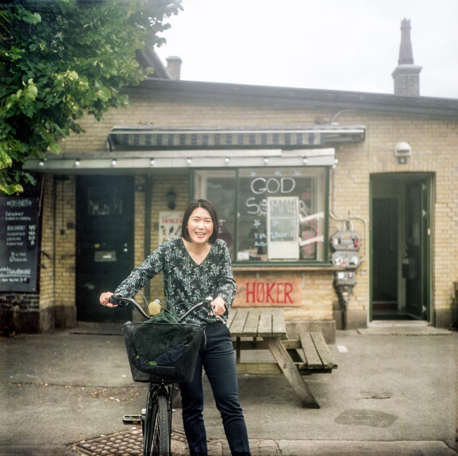 My girlfriend and her bike in Kødbyen, Copenhagen. Taken with the Yashica Mat 124g 80mm f3.5 with Kodak Portra 160 film